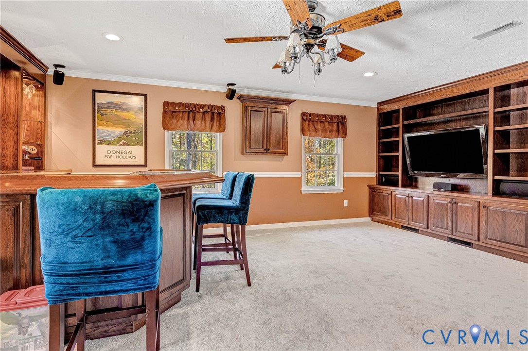 7135 Timber Ridge Road Quinton, VA 23141 - Photo 3 of 48 Bonus room with dry bar, mini refrigerator, TV w/s