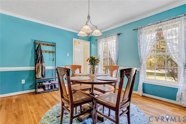 a living room filled with furniture window and a table