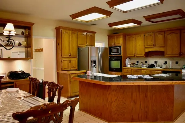 a bathroom with a sink and vanity