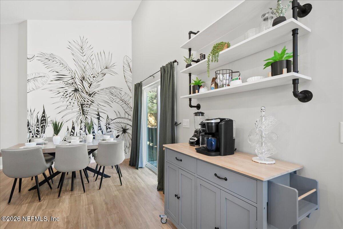 800 9th Street St. Augustine, FL 32084 - Photo 11 of 45 a kitchen with a table and chairs in it