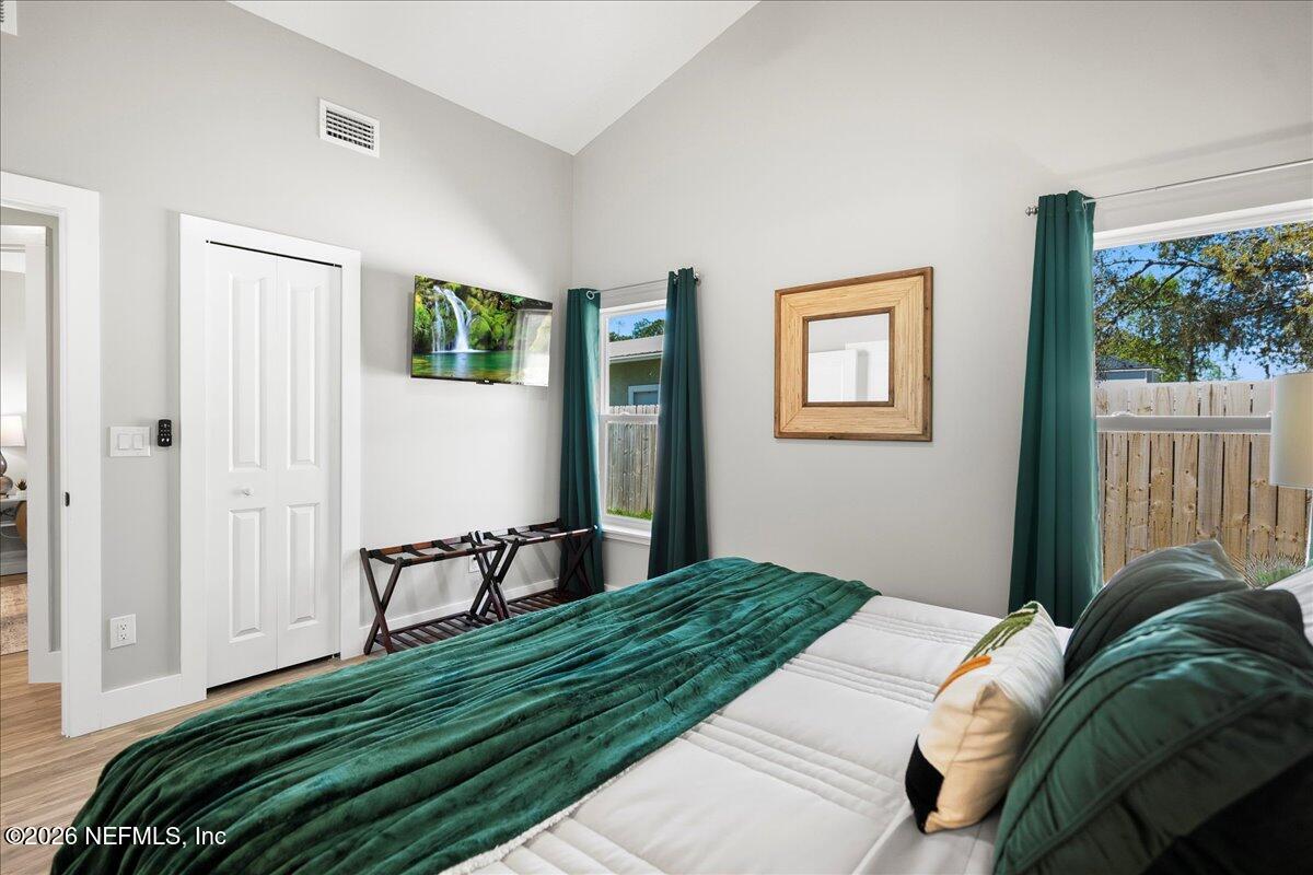 800 9th Street St. Augustine, FL 32084 - Photo 21 of 45 a bedroom with a bed and a window