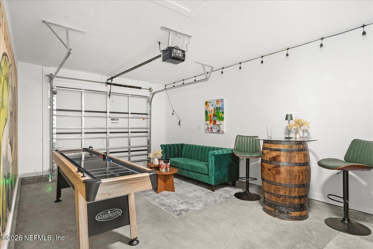 800 9th Street St. Augustine, FL 32084 - Photo 30 of 45 a room with furniture and a window