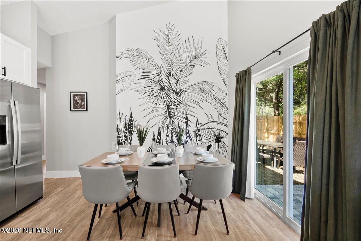 800 9th Street St. Augustine, FL 32084 - Photo 5 of 45 a view of a dining room with furniture window and outside view