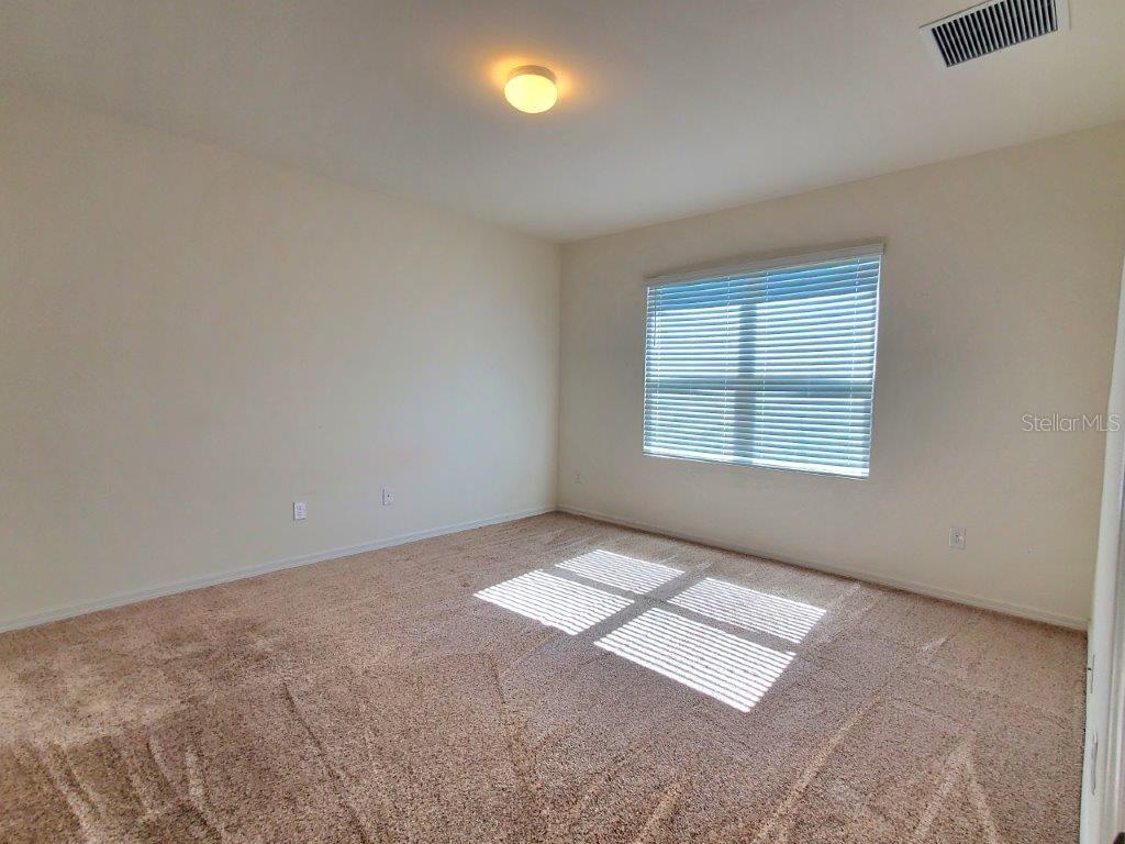 25525 Gorham Lane Punta Gorda, FL 33950 - Photo 12 of 34 an empty room with windows