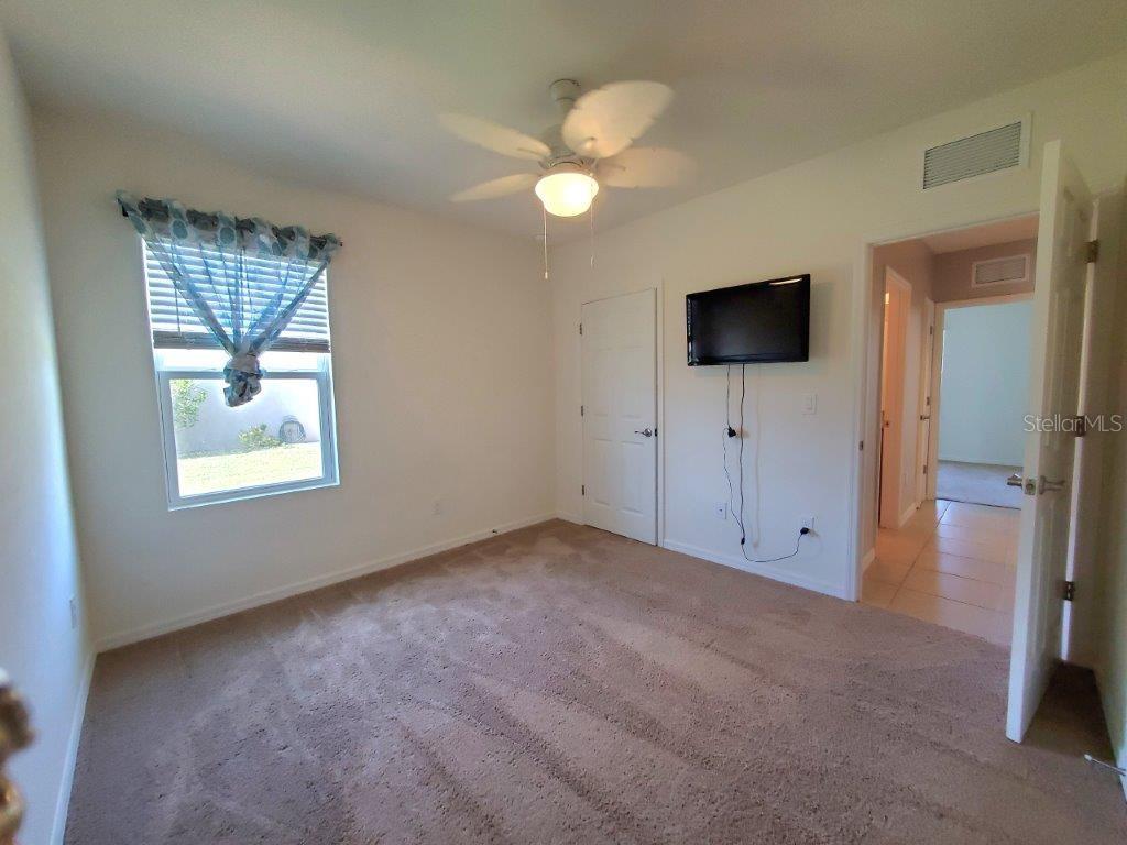 25525 Gorham Lane Punta Gorda, FL 33950 - Photo 15 of 34 a view of a livingroom with a flat screen tv