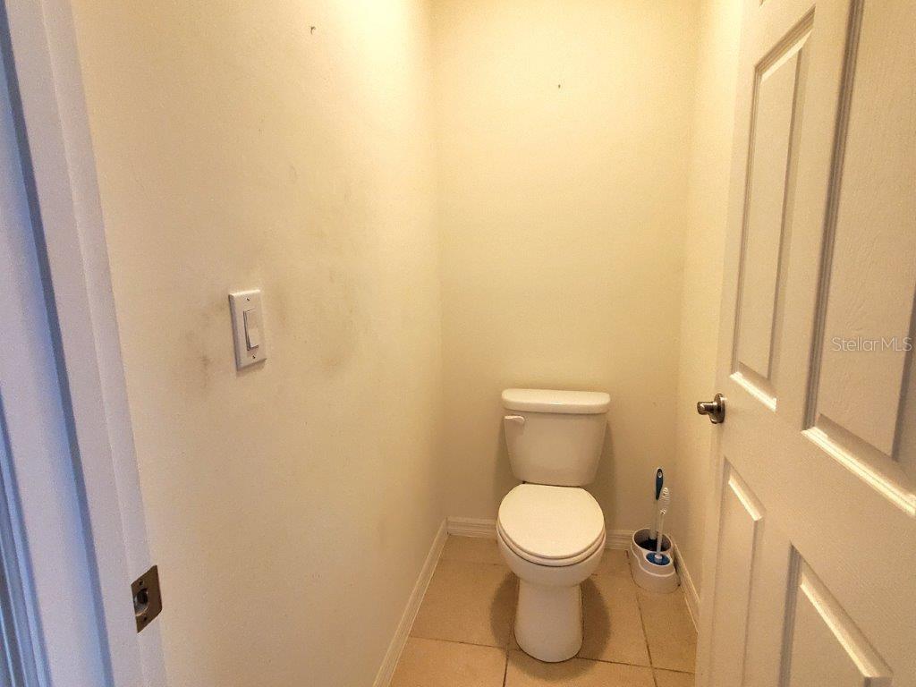 25525 Gorham Lane Punta Gorda, FL 33950 - Photo 17 of 34 a white toilet sitting next to a shower