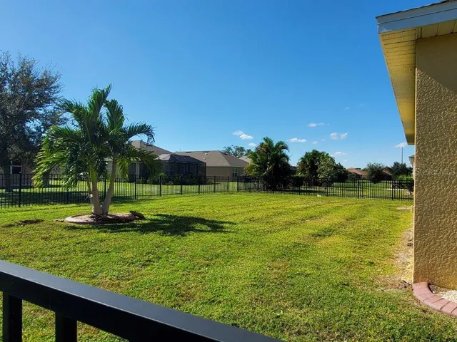 a view of a garden and basketball court