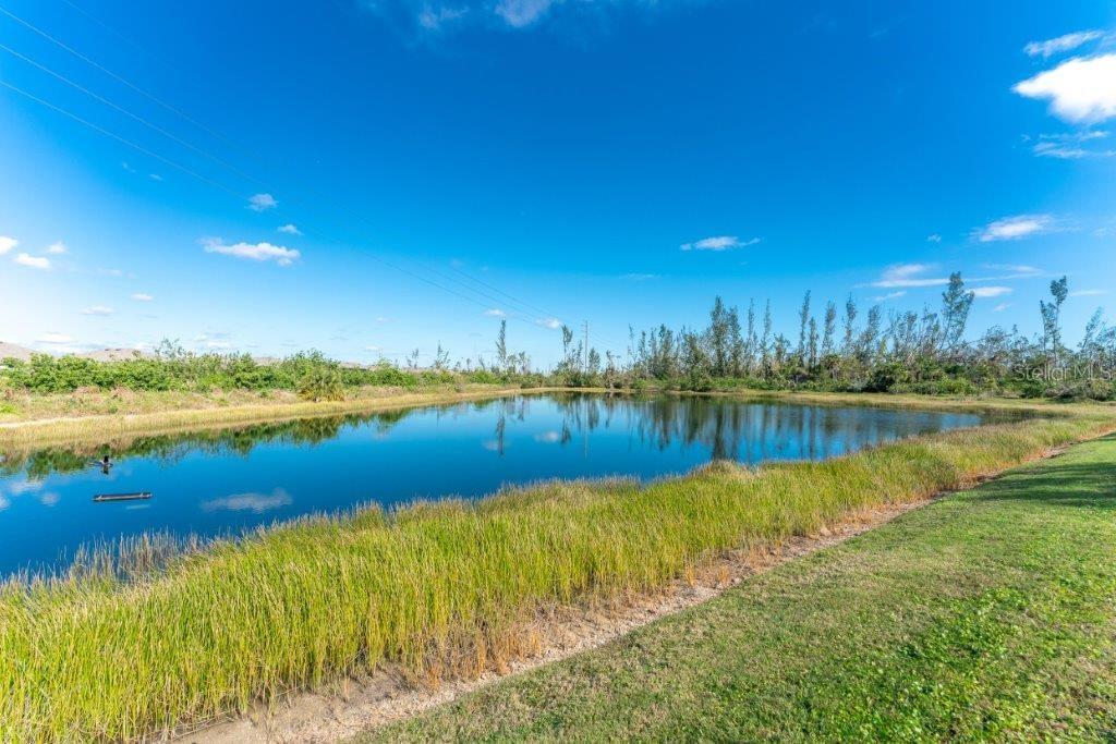 25525 Gorham Lane Punta Gorda, FL 33950 - Photo 32 of 34 a view of a lake with a city