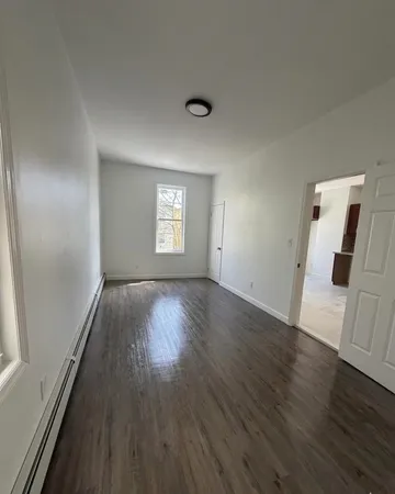 a bathroom with a sink a toilet and bathtub