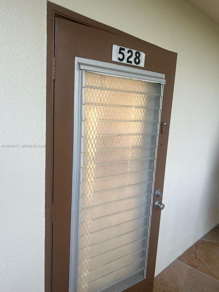 528 Mansfield M, Unit 528 Boca Raton, FL 33434 - Photo 1 of 14 a close view of door