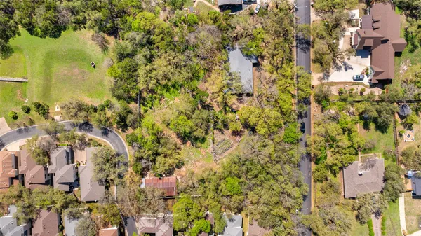 an aerial view of residential house with parking space