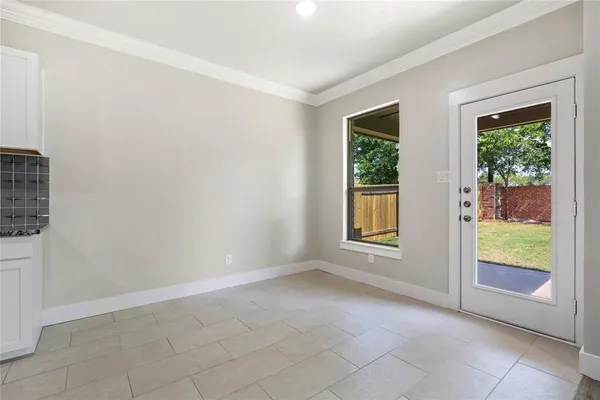 a view of an empty room with window