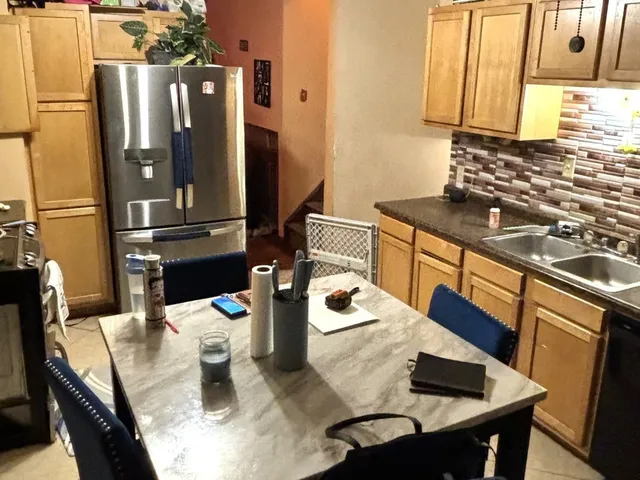 a living room with chairs