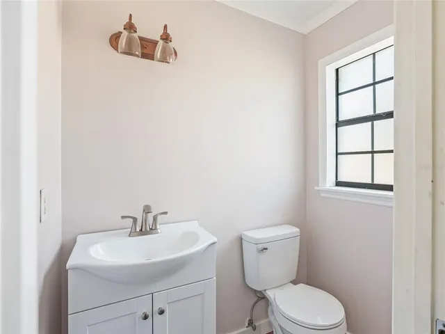 a house with trees in the background