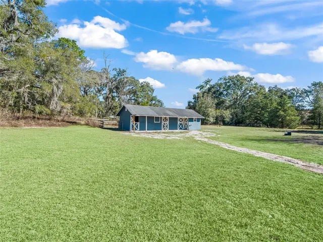 a view of a lush green field
