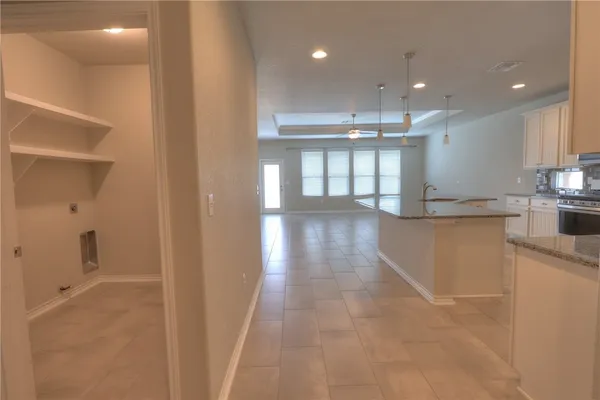 a view of a kitchen and a sink
