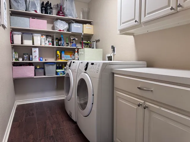 a utility room with dryer and washer