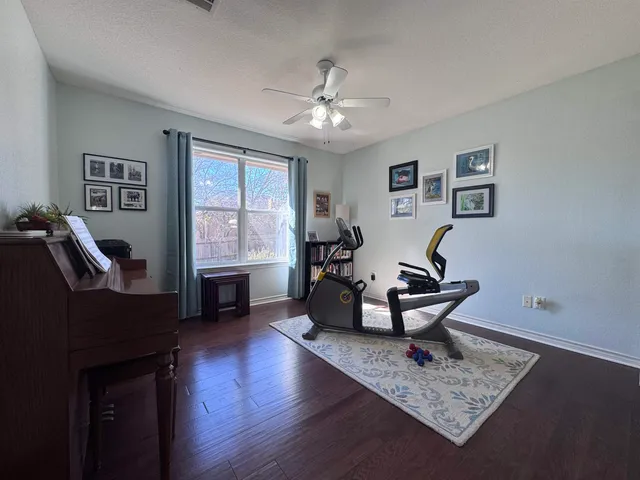 a living room with furniture and window