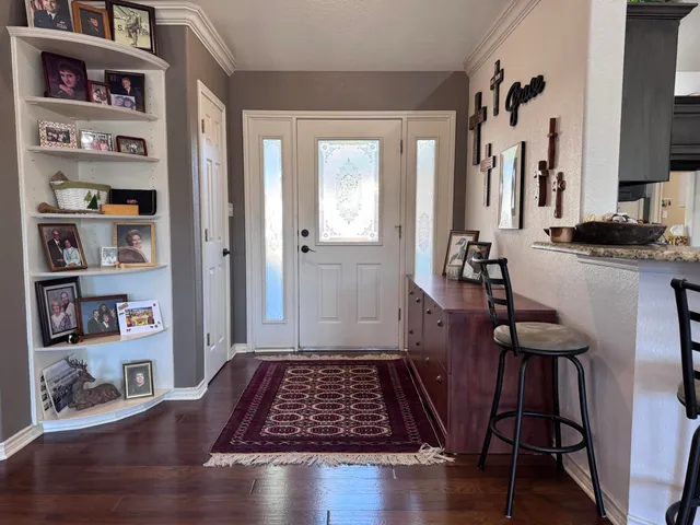 a view of livingroom with furniture and wooden floor