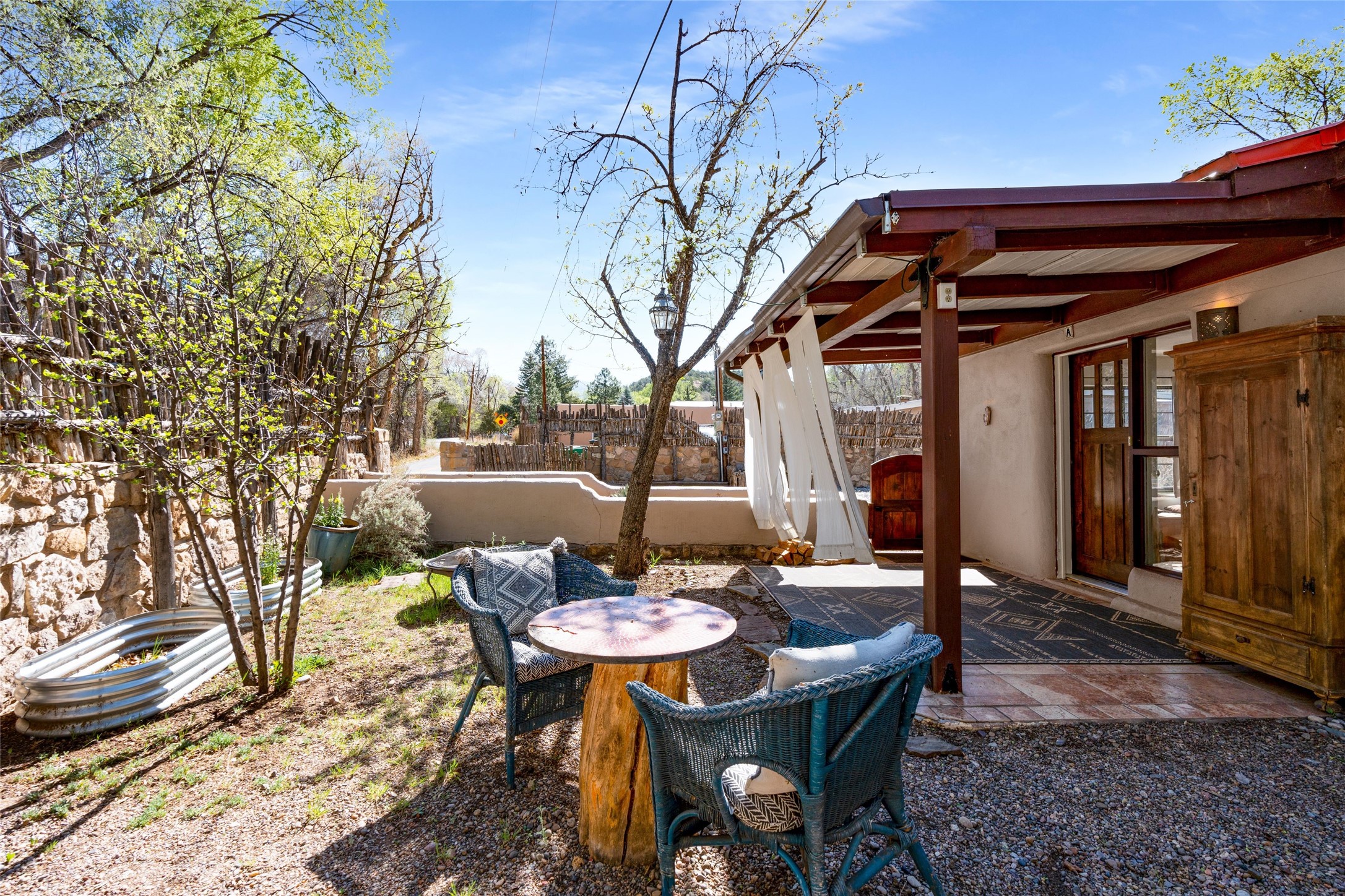 1402 Bishops Lodge Road, Unit A Santa Fe, NM 87506 - Photo 38 of 40 Front Gardens & Covered Patio