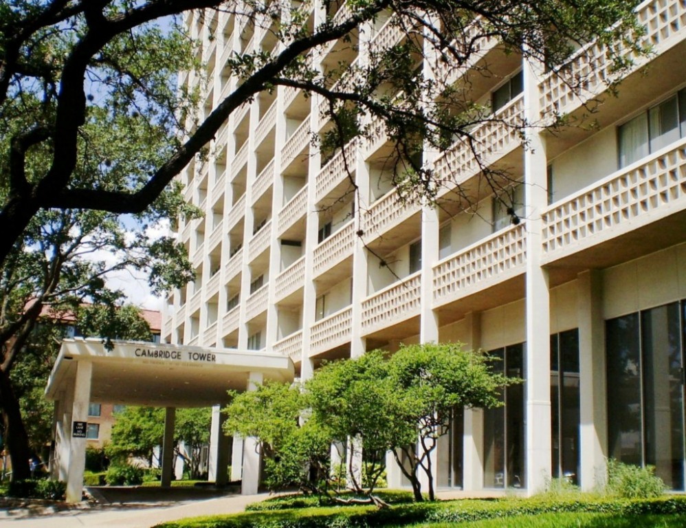 front view of building with a tree