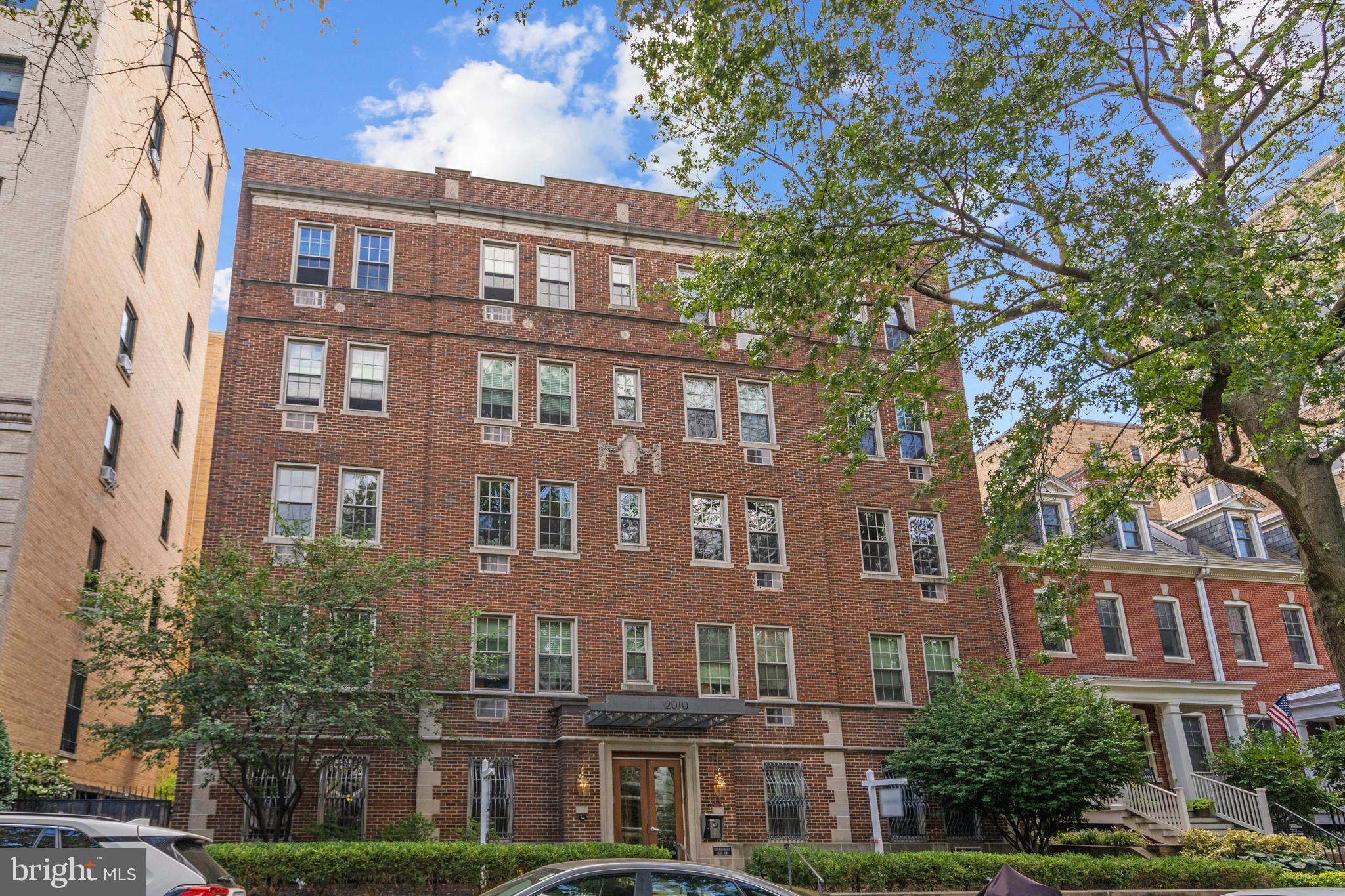 2010 Kalorama Road Northwest, Unit 306 Washington, DC 20009 - Photo 1 of 26 a front view of a multi story building