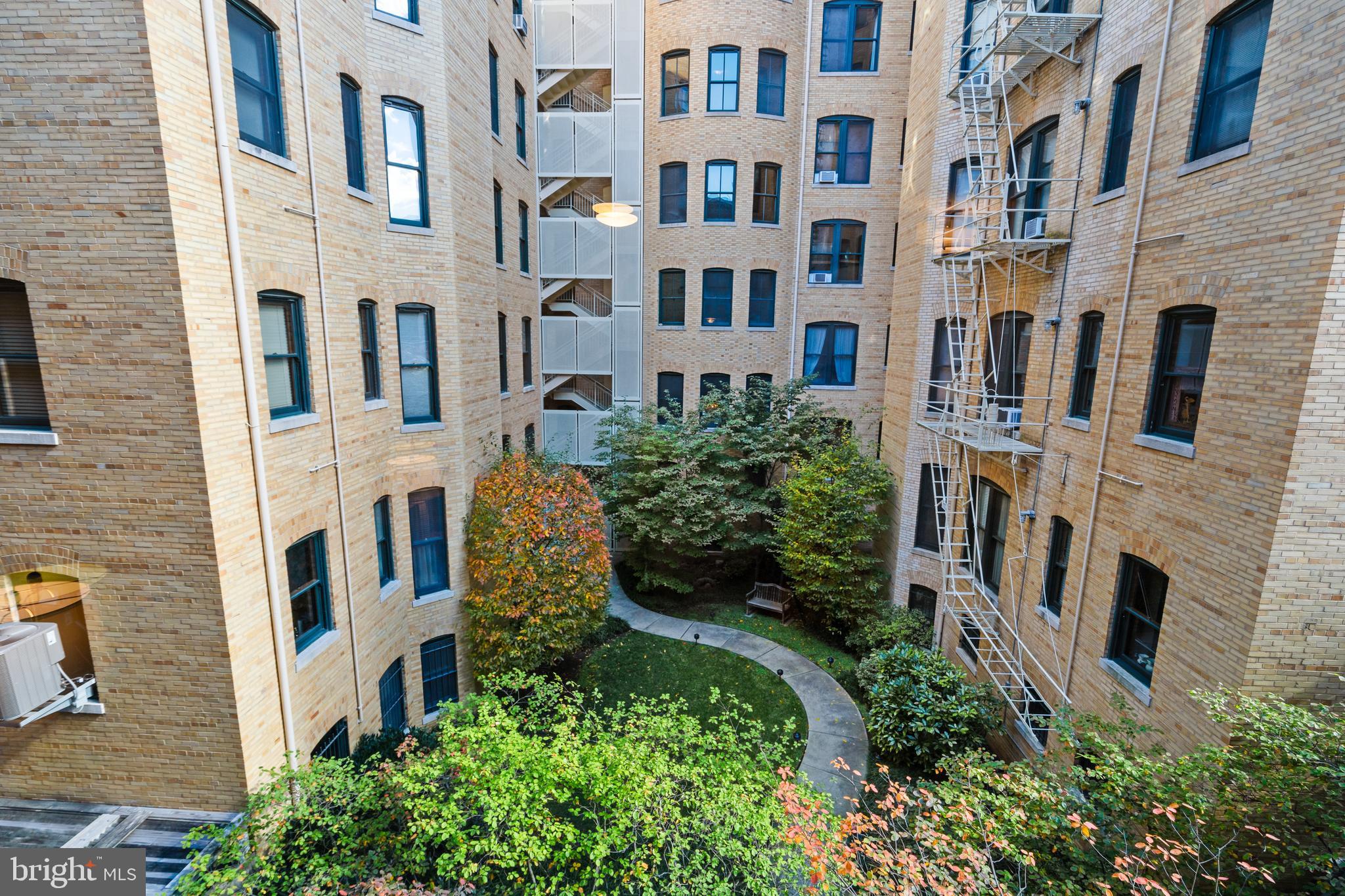 2010 Kalorama Road Northwest, Unit 306 Washington, DC 20009 - Photo 17 of 26 a view of a building with a garden