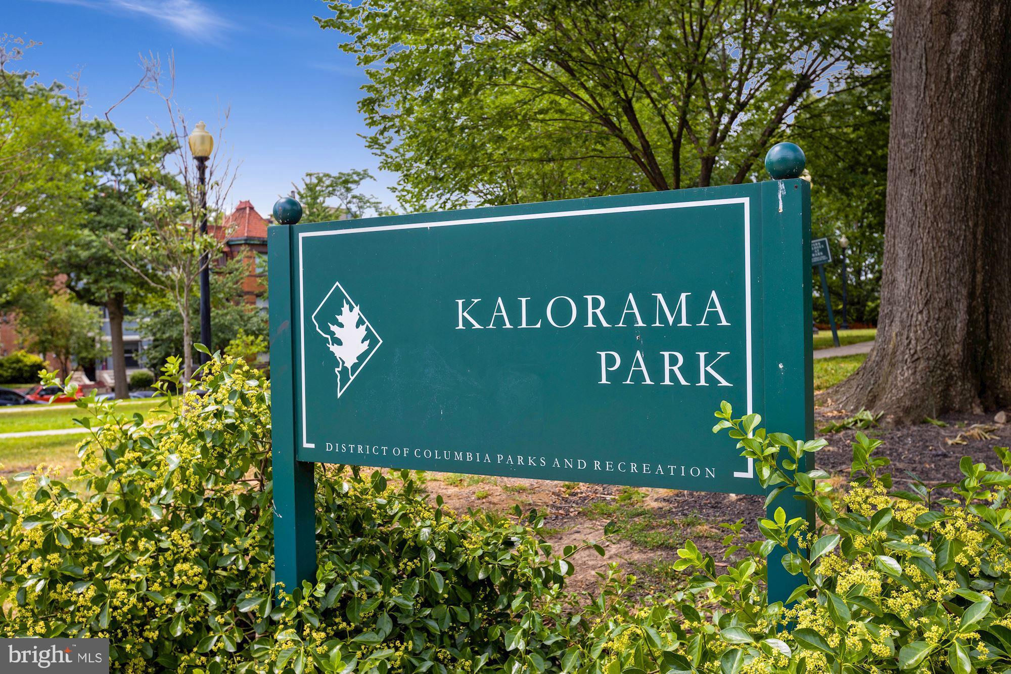 2010 Kalorama Road Northwest, Unit 306 Washington, DC 20009 - Photo 19 of 26 a sign that is sitting on a brick wall