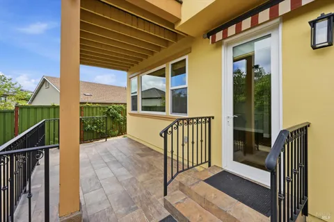 a view of porch with wooden floor