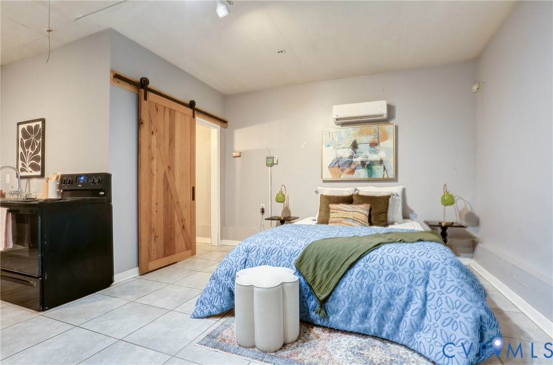 661 Greencastle Road Chesterfield, VA 23236 - Photo 26 of 28 a bedroom with a bed and wooden floor
