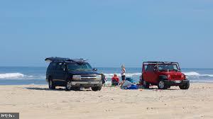 Stephen Decatur Highway Berlin, MD 21811 - Photo 24 of 28 a bed room with a bed and a couch