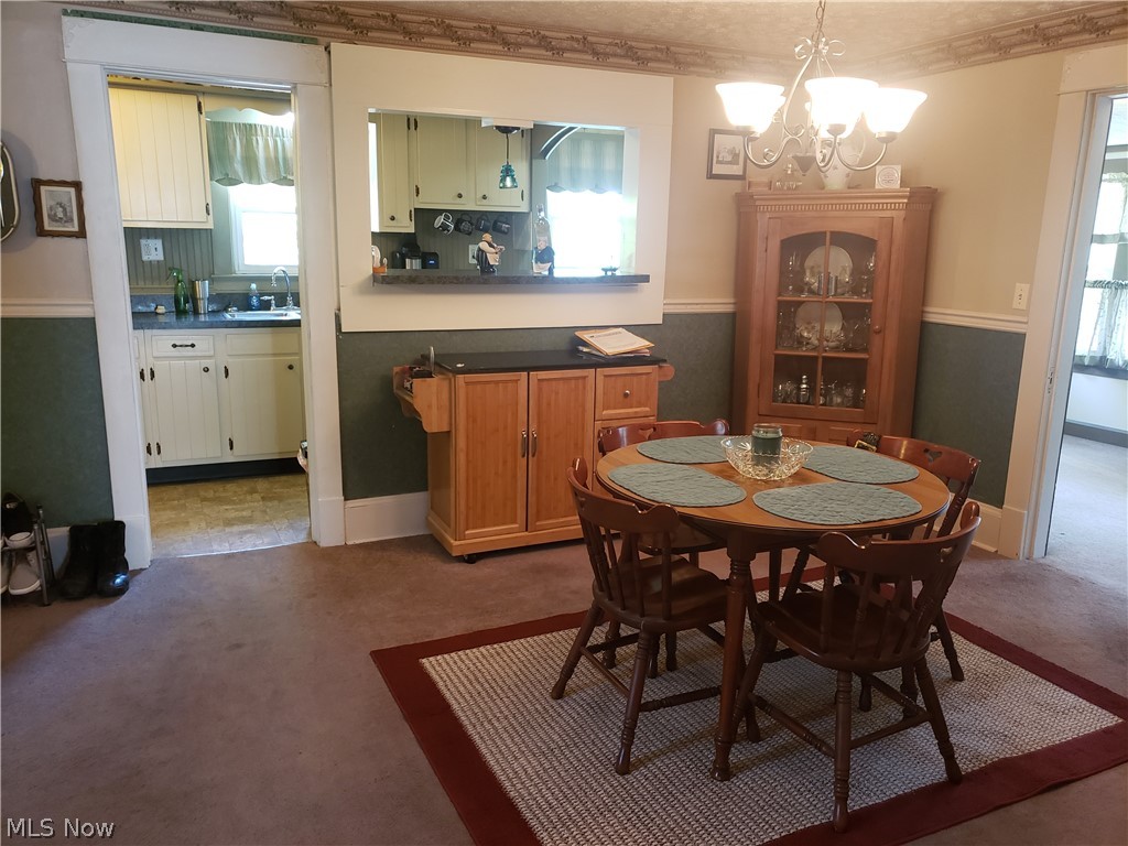 15766 Ravenna Road Newbury, OH 44065 - Photo 12 of 26 The large dining room is open to the kitchen