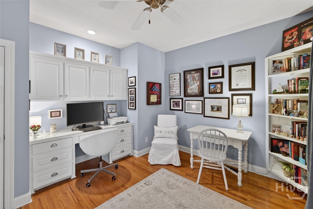 341 Youman's Road Midway, GA 31320 - Photo 22 of 52 Main floor office space with custom corner built-ins and desk