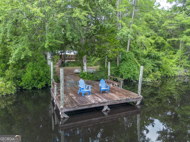 a view of porch with wooden floor in outdoor space
