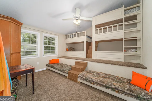 a view of a livingroom with a staircase