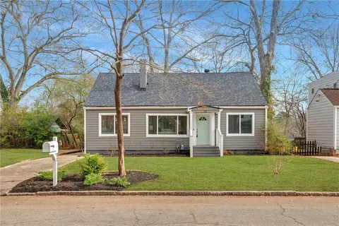 front view of a house with a yard