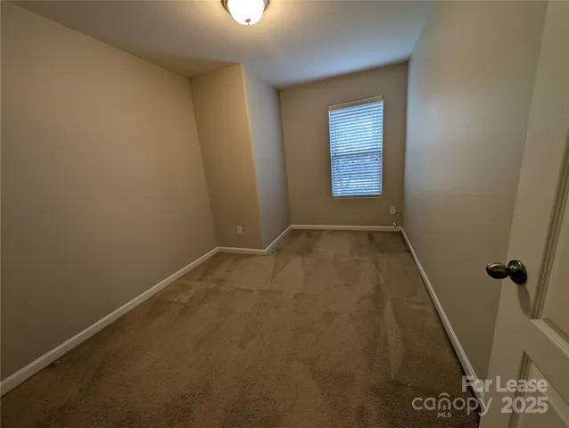 an empty room with a door