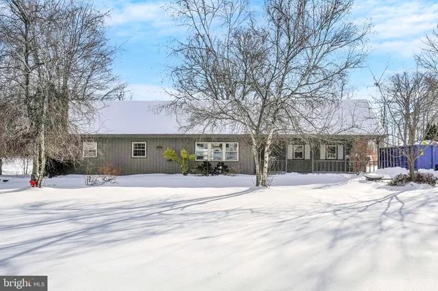 a front view of house with yard