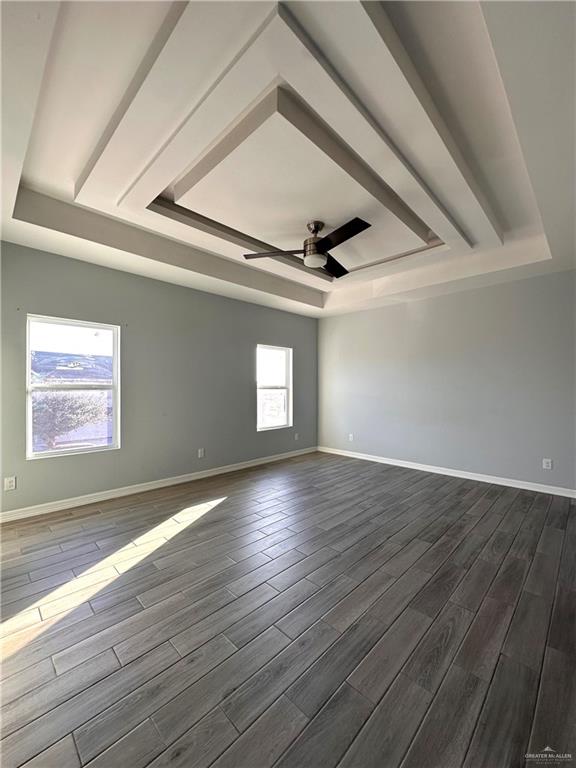 1038 Yellow Hammer Street Rio Grande City, TX 78582 - Photo 8 of 20 a view of an empty room with wooden floor and a window