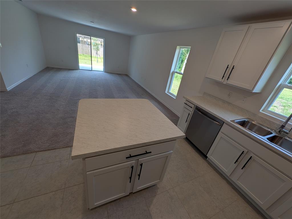 9065 107th Court Vero Beach, FL 32967 - Photo 14 of 40 a view of an empty room with a window