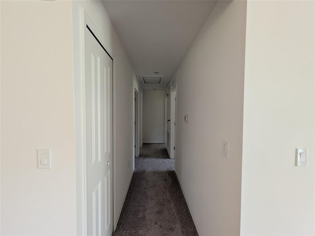 9065 107th Court Vero Beach, FL 32967 - Photo 17 of 40 a view of a hallway with a white walls