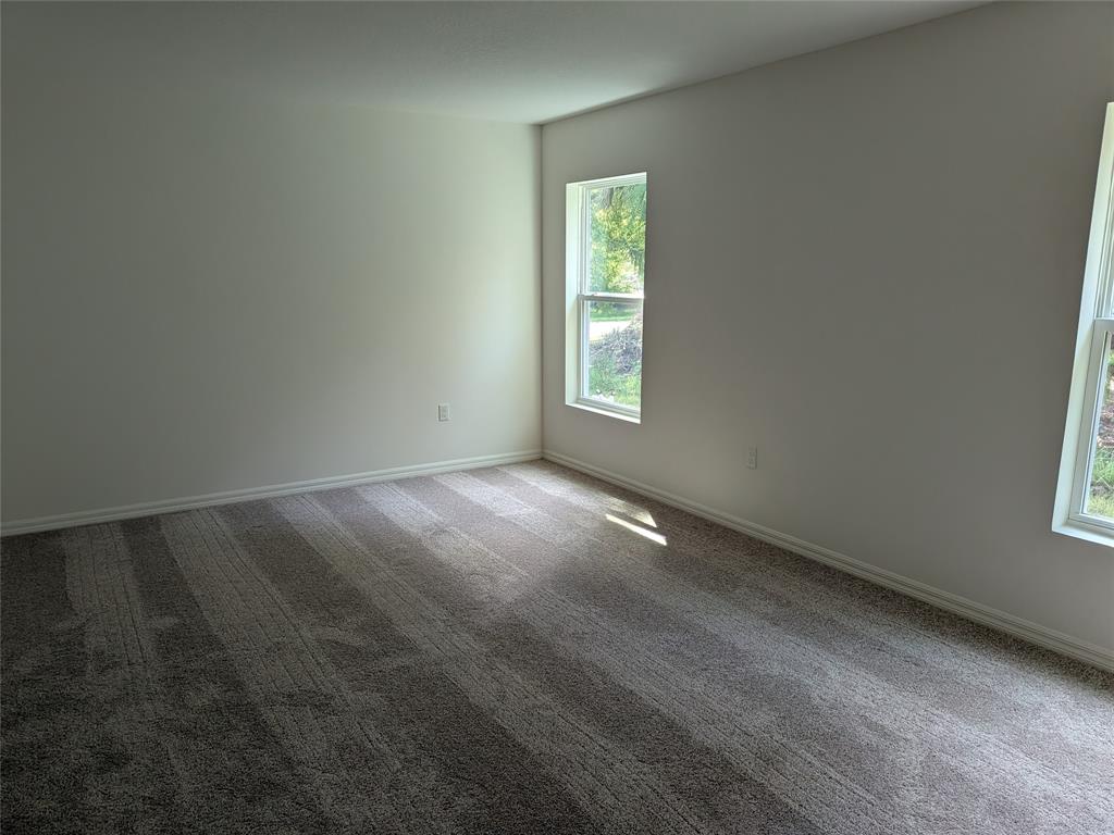 9065 107th Court Vero Beach, FL 32967 - Photo 21 of 40 an empty room with windows