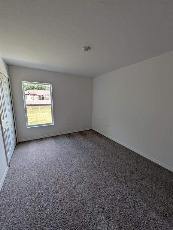 9065 107th Court Vero Beach, FL 32967 - Photo 34 of 40 an empty room with a window