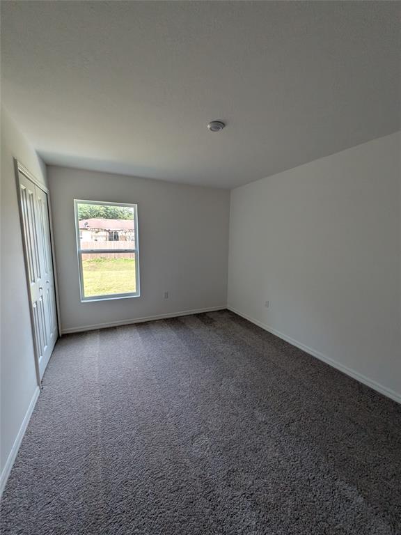 9065 107th Court Vero Beach, FL 32967 - Photo 35 of 40 an empty room with a window