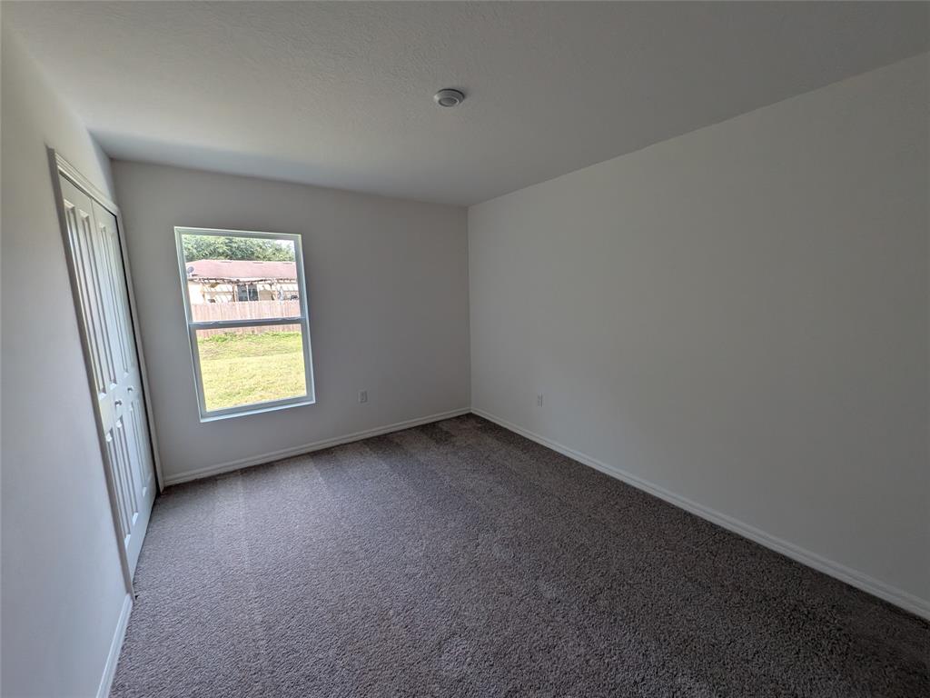 9065 107th Court Vero Beach, FL 32967 - Photo 36 of 40 an empty room with a window