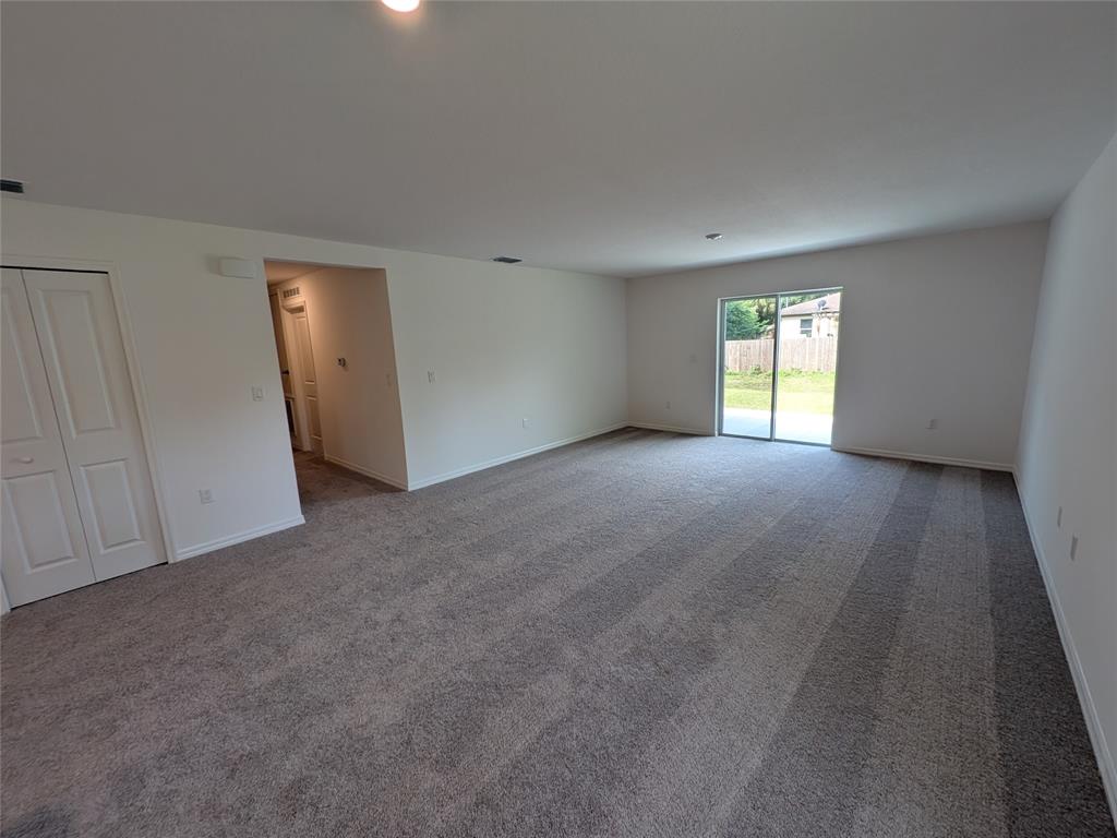 9065 107th Court Vero Beach, FL 32967 - Photo 39 of 40 a view of an empty room with a window