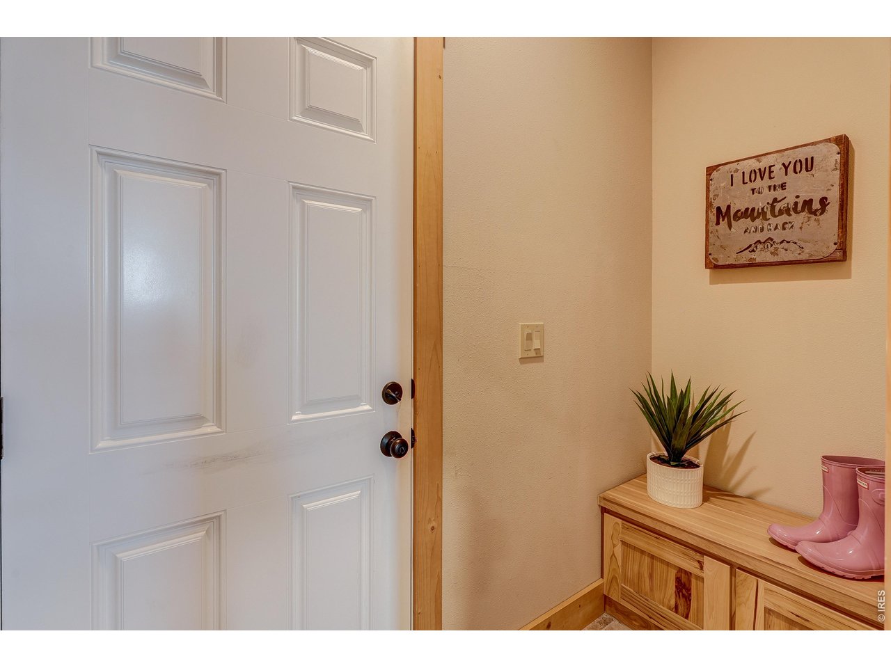 18298 Romar Ranch Road Carr, CO 80612 - Photo 31 of 49 a view of a hallway with a elevator