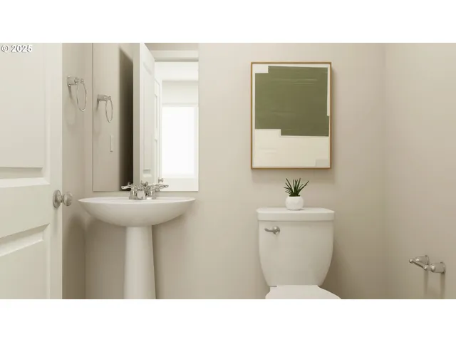 a bedroom with furniture and a potted plant