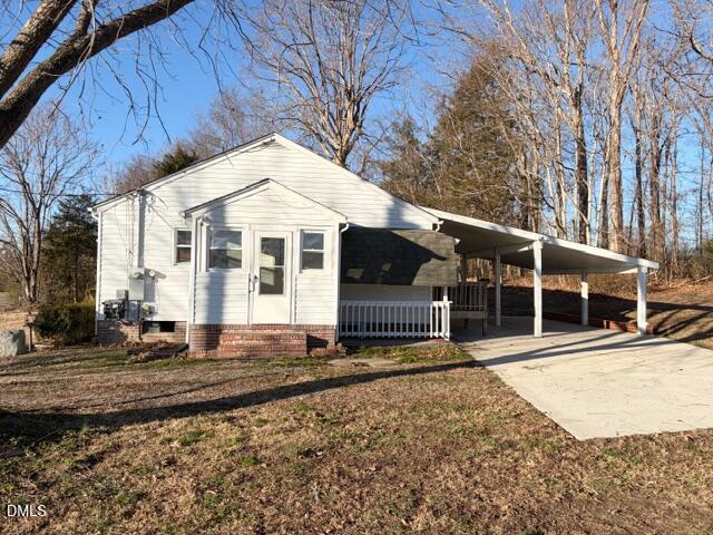 1151 Morton-Pulliam Road Roxboro, NC 27574 - Photo 3 of 27 Side view-Ramp can be removed to add a second parking under carport