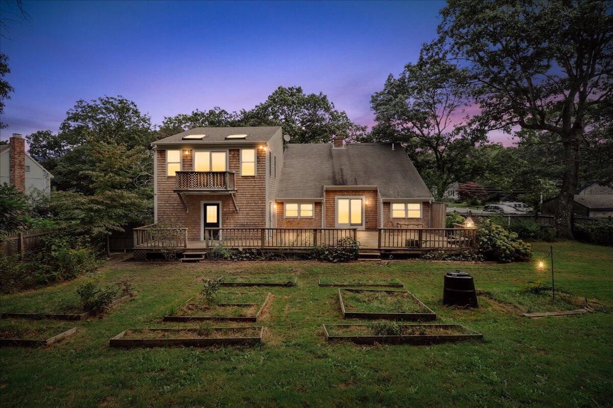 50 South Sandwich Road Mashpee, MA 02649 - Photo 34 of 50 27-Twilight Rear View